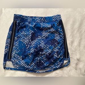 RLX Ralph Lauren size 6 golf skort. Navy w lime green shorts. Great condition